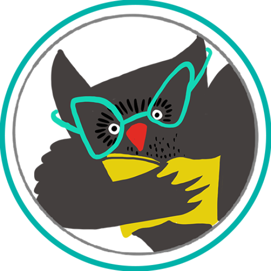 A black owl wearing teal glasses and clutches a yellow book.